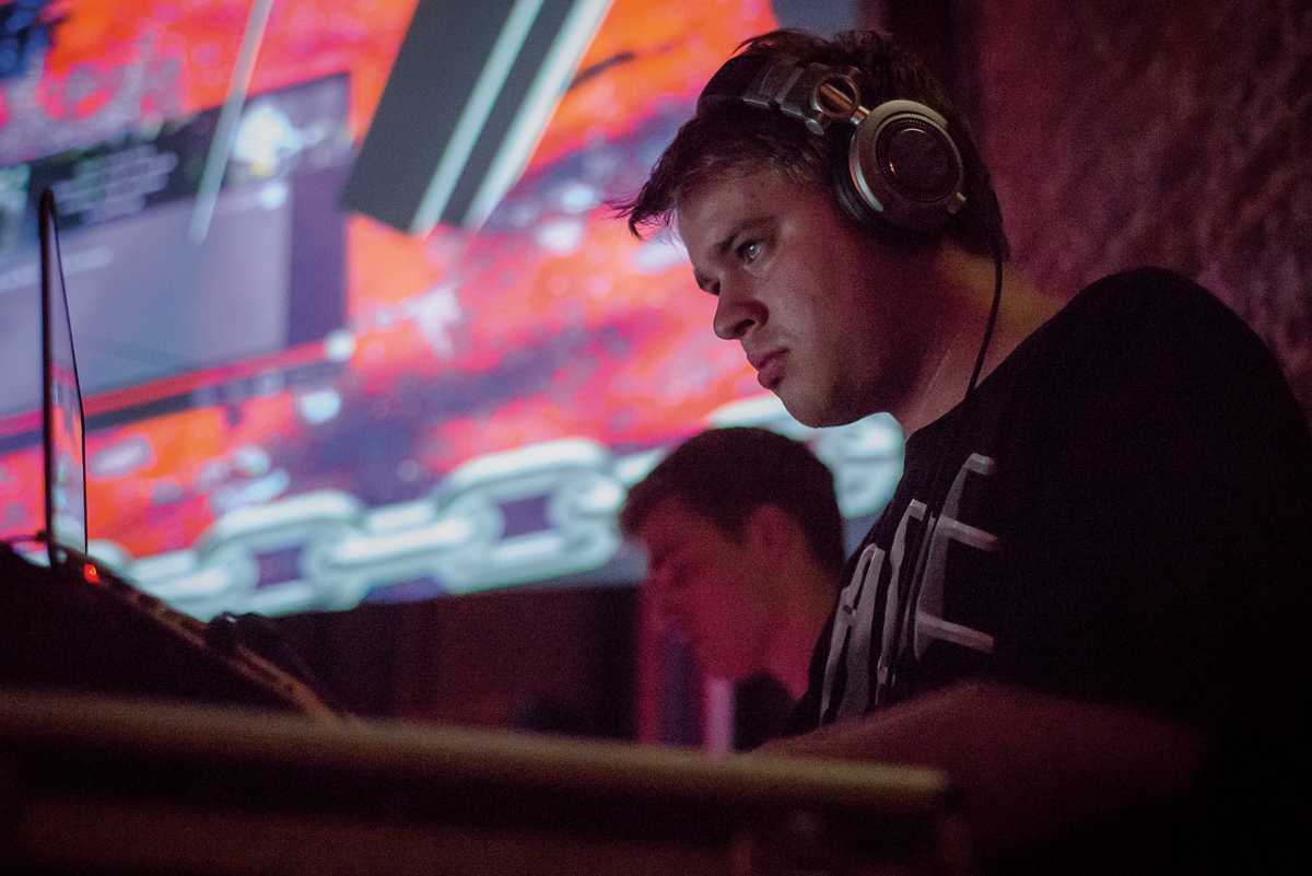 During his set, Quam is deeply lost in his thoughts as he stares at his decks.