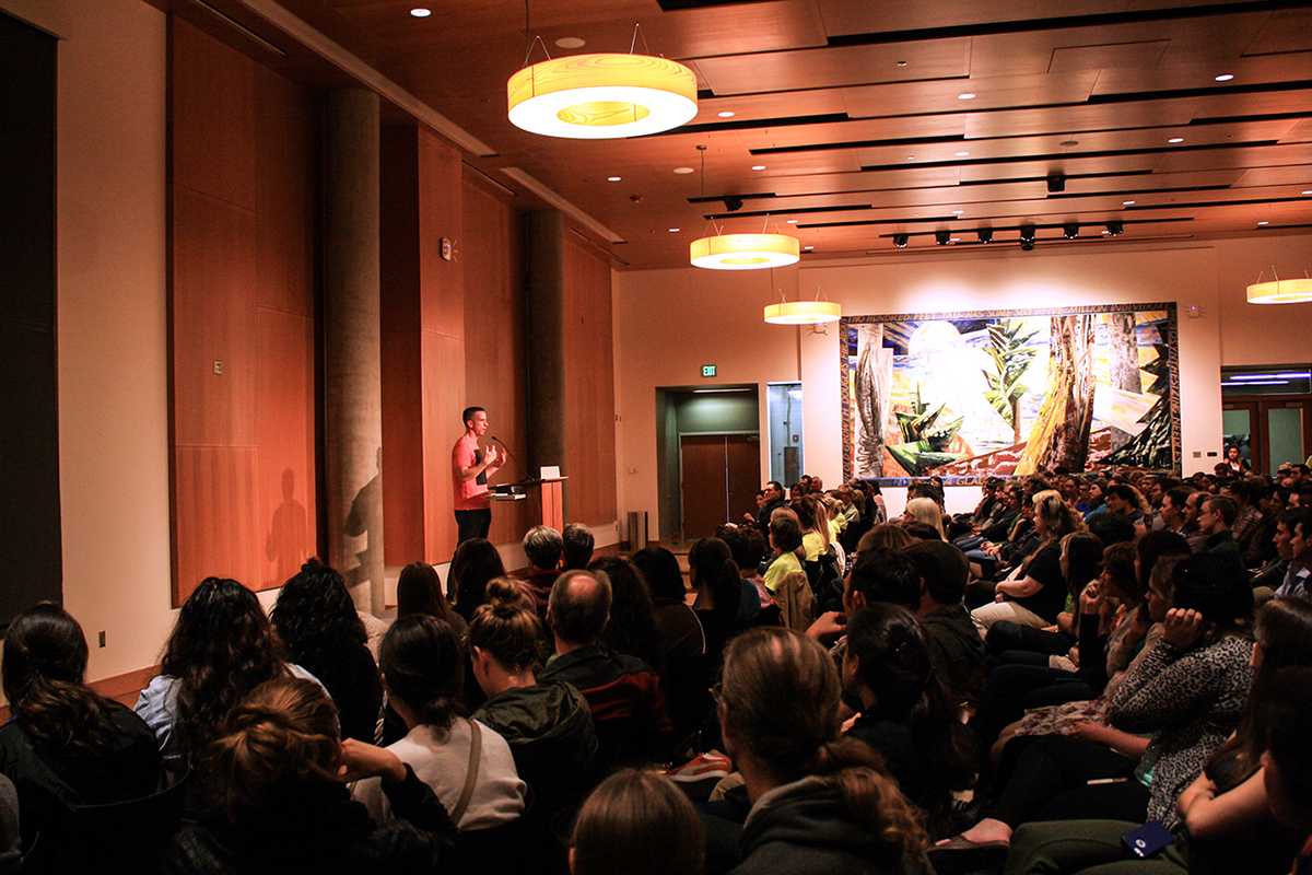 Dan Savage addressing questions asked by the audience of the Ford Alumni Center Ballroom.