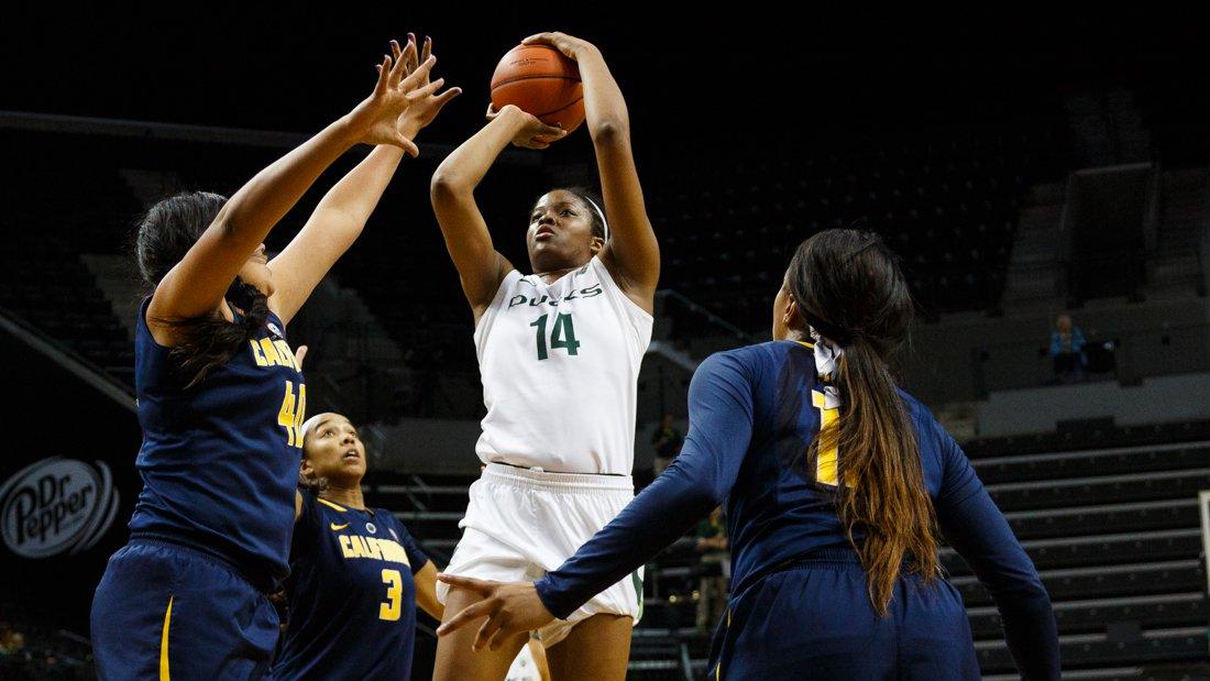 Oregon forward Jillian Alleyne (14) shoots over the California defense during the second half. The Oregon Ducks play the California Golden Bears at Matthew Knight Arena in Eugene, Oregon on February 26, 2015. (Ryan Kang/Emerald)