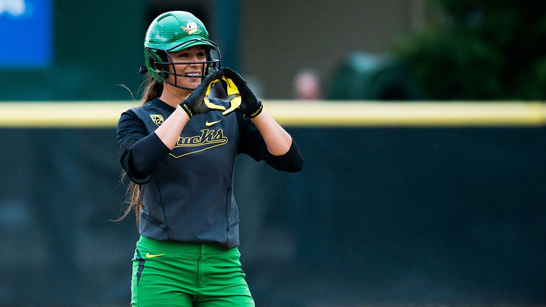 Oregon infielder Nikki Udria (3) holds up the &#8220;O&#8221; after scoring a double during the bottom of the sixth inning. No. 1 ranked Oregon hosted No. 3 ranked Arizona State in game two of the series at Howe Field in Eugene, Ore., on Saturday, May 3, 2014. (Andrew Seng/Emerald)