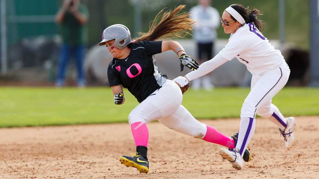 Oregon outfielder Koral Costa (7) is tagged out after trying to steal second base during the fifth inning. The Oregon Ducks play the Washington Huskies at Howe Field in Eugene, Oregon on March 28, 2015. (Ryan Kang/Emerald)