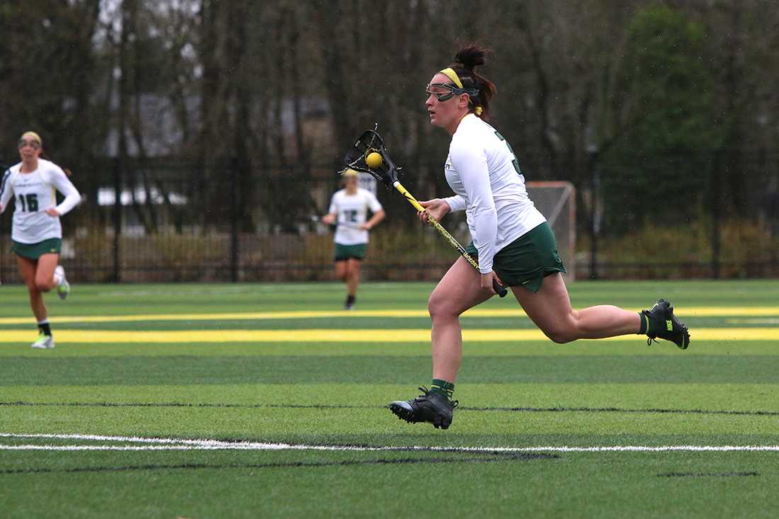 Oregon attacker Olivia Pyne (3) makes her way toward the net. The Oregon Ducks defeat Richmond at Pape Field in Eugene, Oregon on Sunday, March 15. (Eve Hess/Emerald)