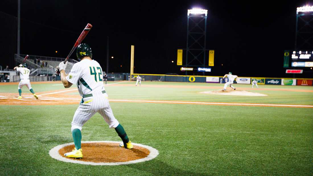 Oregon infielder Phil Craig-St. Louis (42) warms up to bat during the bottom of the eighth inning. The Oregon Ducks play the San Francisco Dons at PK Park in Eugene, Oregon on Tuesday, March 10. (Taylor Wilder/Emerald)