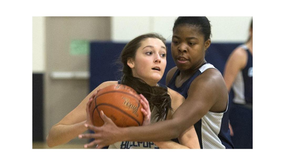 Gonzaga Preparatory School women&#8217;s basketball player Oti Gelden, left, battles for the ball during a Gonzaga Prep practice. (Photo courtesy of Jesse Tinsley)