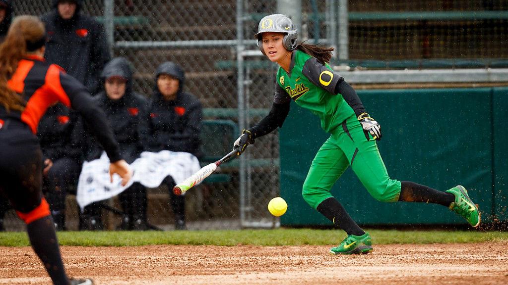 Oregon outfielder Janie Takeda (19) hits the bunt during the third inning. The Oregon Ducks play the Oregon State Beavers at Howe Field in Eugene, Oregon on March 15, 2015. (Ryan Kang/Emerald)