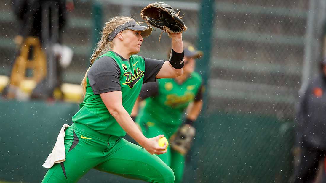 Oregon relief pitcher Jasmine Smithson-Willett (55) winds up to pitch during the second inning. The Oregon Ducks play the Oregon State Beavers at Howe Field in Eugene, Oregon on March 15, 2015. (Ryan Kang/Emerald)