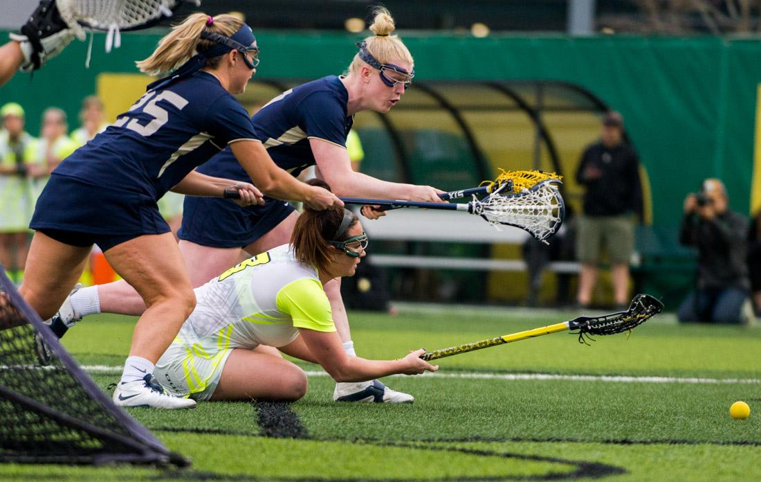 Oregon attacker Olivia Pyne (3) fights for the ball against George Washington during the second half at a game between Oregon and the George Washington Colonials at Pap&#142; Field on Tuesday, March 10, 2015 in Eugene, Ore. (Andrew Seng/Emerald)