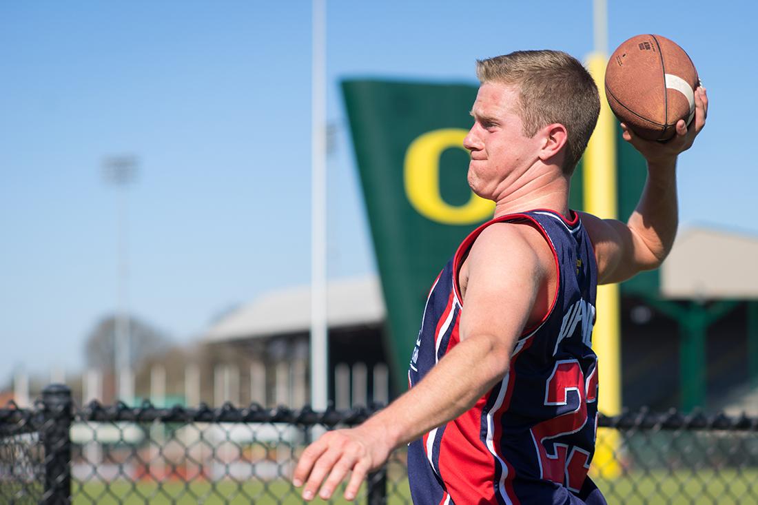 Oregon sophomore Andy Werderman throws a football on the rec fields outside of the Student Recreational Center on Sunday, March 8, 2015. (Cole Elsasser/Emerald)