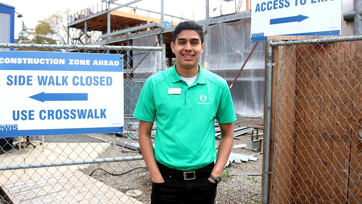 Student ambassador and multicultural recruiter, Frank Laro takes the mission personally. A junior with a double major in sociology and Spanish, Laro was the first in his family to go to college. (Tabatha Natsues/Emerald)