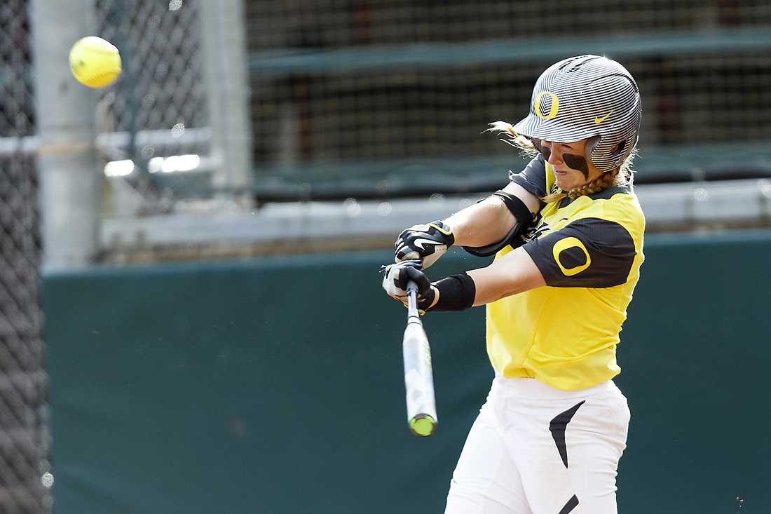 Oregon infielder Jenna Lilley (00) hits a home run during the fourth inning. The Oregon Ducks play the Louisiana Ragin&#8217; Cajuns at Howe Field in Eugene, Oregon on April 24, 2015. (Ryan Kang/Emerald)