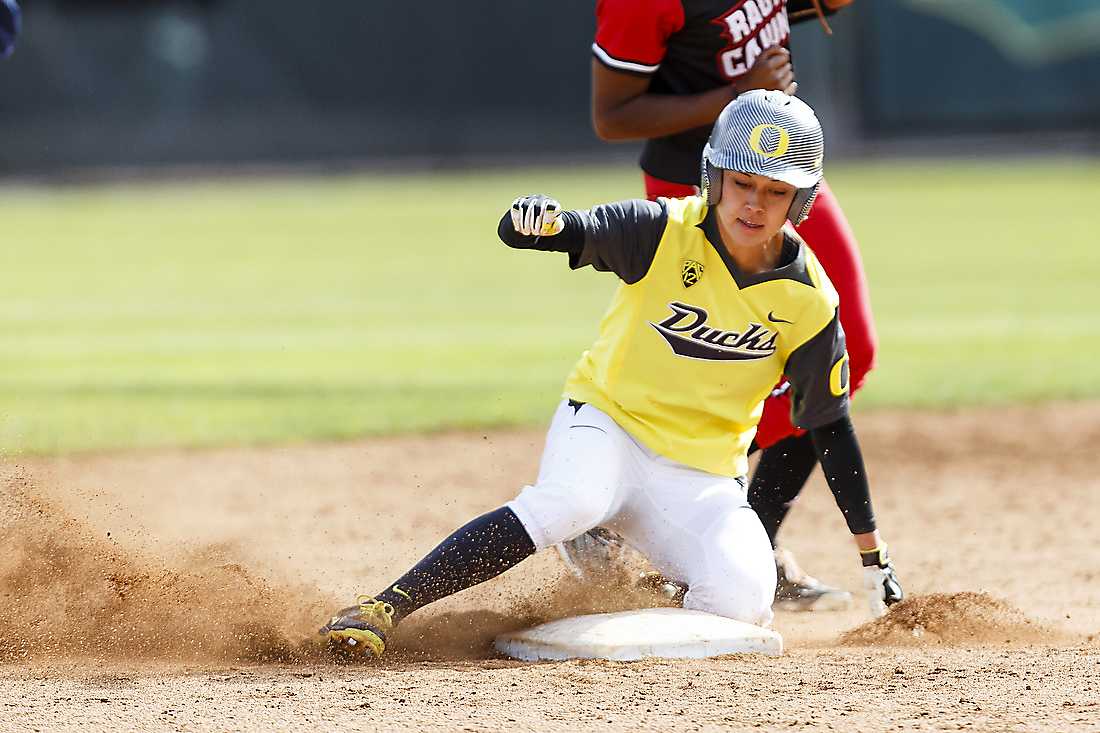 Oregon outfielder Janie Takeda (19) steals second base, passing the all-time Oregon record for stolen bases during the second inning. The Oregon Ducks play the Louisiana Ragin' Cajuns at Howe Field in Eugene, Oregon on April 24, 2015. (Ryan Kang/Emerald)