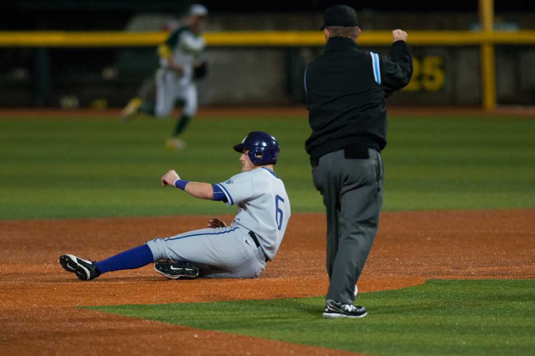 Husky infielder Chris Baker (6) is called out sliding into second. The Oregon Ducks play the Washington Huskies at P.K. Park in Eugene, Oregon on April 25, 2015. (Cole Elsasser/Emerald)