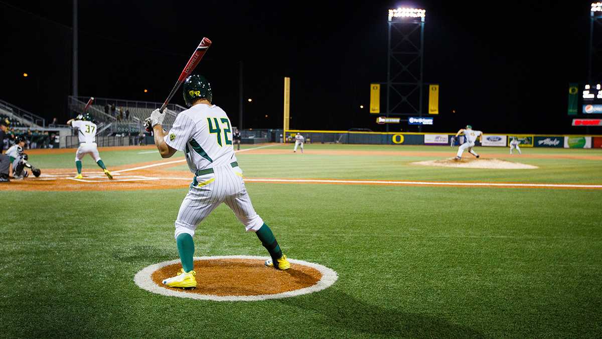 Oregon infielder Phil Craig-St. Louis (42) warms up to bat during the bottom of the eighth inning. The Oregon Ducks play the San Francisco Dons at PK Park in Eugene, Oregon on Tuesday, March 10. (Taylor Wilder/Emerald)