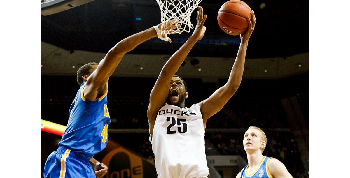 Oregon center Michael Chandler (25) goes up towards the hoop during the second half of the game against UCLA. (Ryan Kang/Emerald)