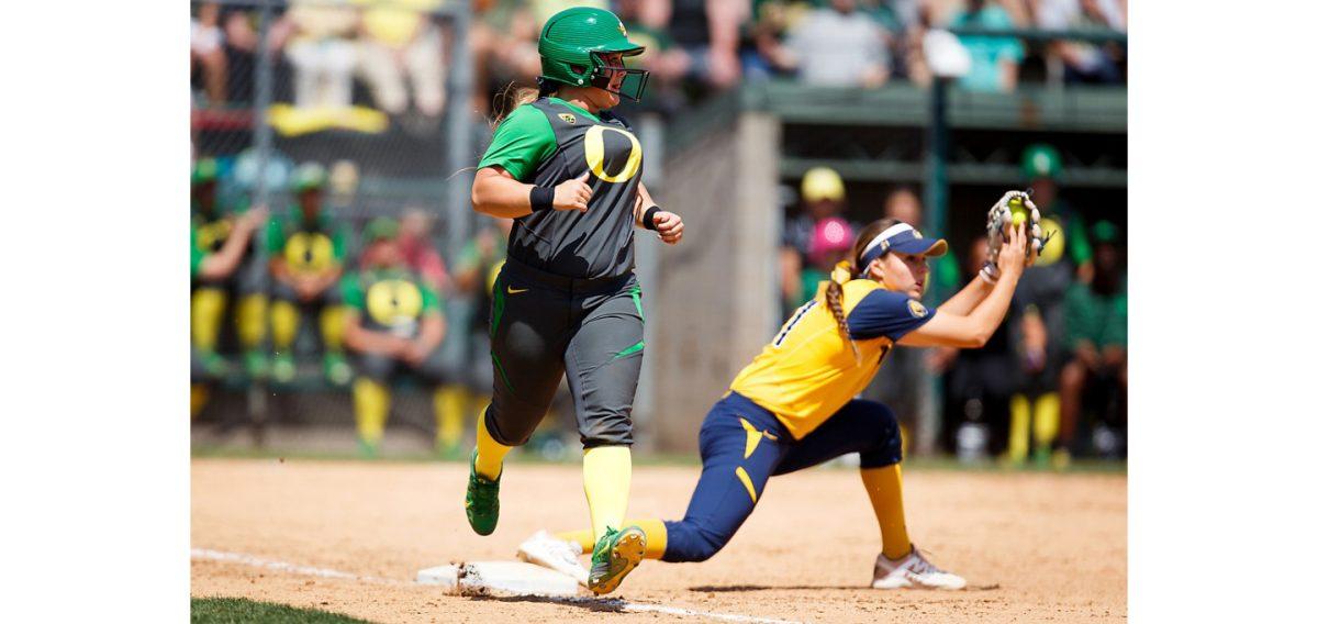 Oregon infielder Hailey Decker (14) beats the ball to first base during the fourth inning. The Oregon Ducks play the California Golden Bears at Howe Field in Eugene, Oregon on May 3, 2015. (Ryan Kang/Emerald)