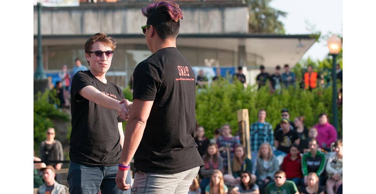 UO&#8217;s Sexual Wellness Advocacy Team, SWAT, preforms in the EMU Amphitheater for Take Back the Night on April 30, 2015. The event focused on intersectionality and sexual assault in the LGBT community. (Cole Elsasser/Emerald)