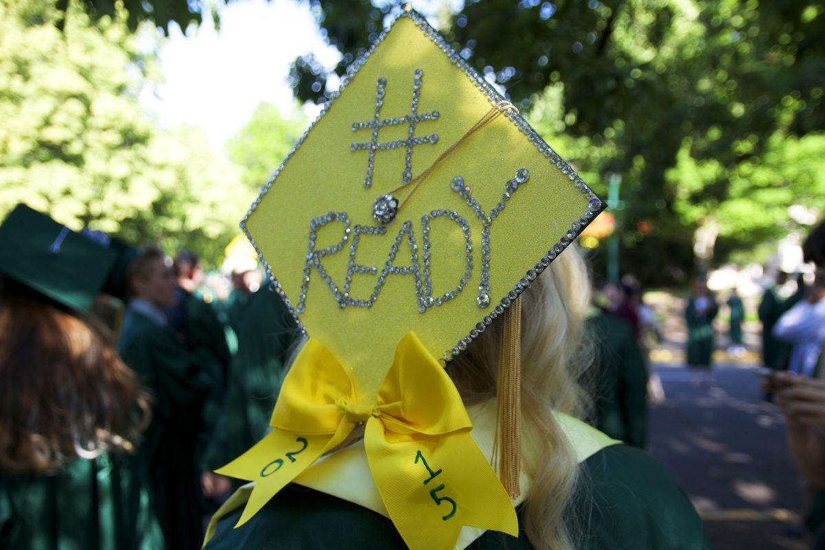 Katelyn Green, a political science major, lets everyone know that she is #ready to take on the working world with this bedazzled cap.