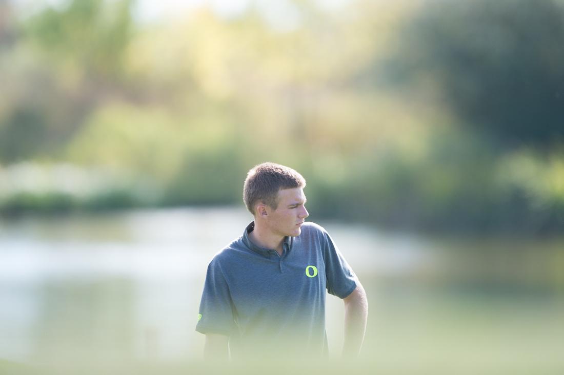 Aaron Wise prepares to putt on the green of hole 9. The Oregon Ducks compete in the first round of the Nike Golf Collegiate Invitational tournament at Pumpkin Ridge Golf Club in North Plains, Oregon. (Adam Eberhardt/Emerald)