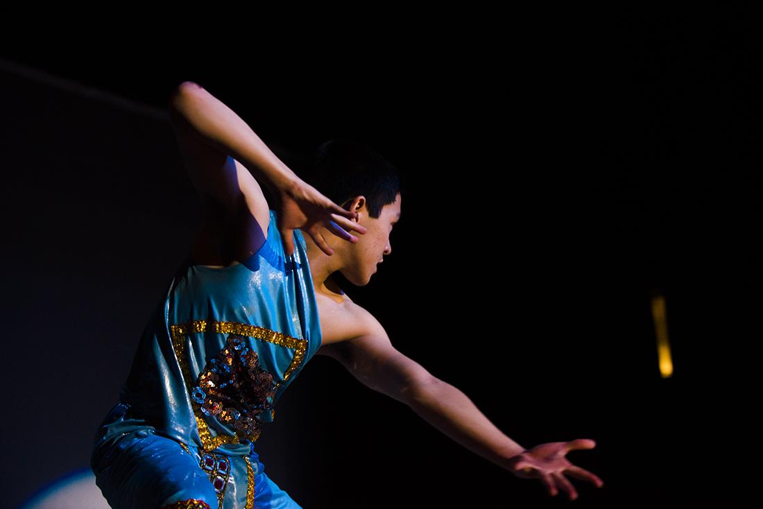 Junior Kevin Lai shows off his Wushu moves during the battle of two gods. The University of Oregon Vietnamese Student Association presented Vietnam Night 2015: Ng&#224;y X&#7917;a Ng&#224;y X&#432;a (Once Upon A Time) at the EMU Ballroom in Eugene, Oregon on April 12th, 2015. (Emerald Archive)