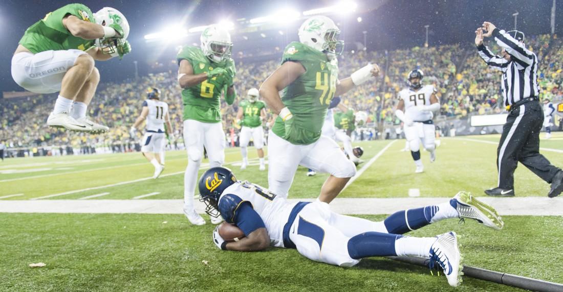 <p>Joe Walker (35) jumps for joy after holding the bears from the first down. The Oregon Ducks host Cal at Autzen Stadium on Nov. 7, 2015. (Cole Elsasser/Emerald)</p>