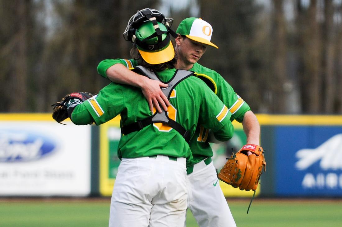 <p>Oregon catcher Tim Susnara (6) and Oregon pitcher Matt Mercer (11) celebrate after the win. The Oregon Ducks face the Utah Utes at PK Park in Eugene, Ore. on March 17, 2016. (Kaylee Domzalski/Emerald)</p>