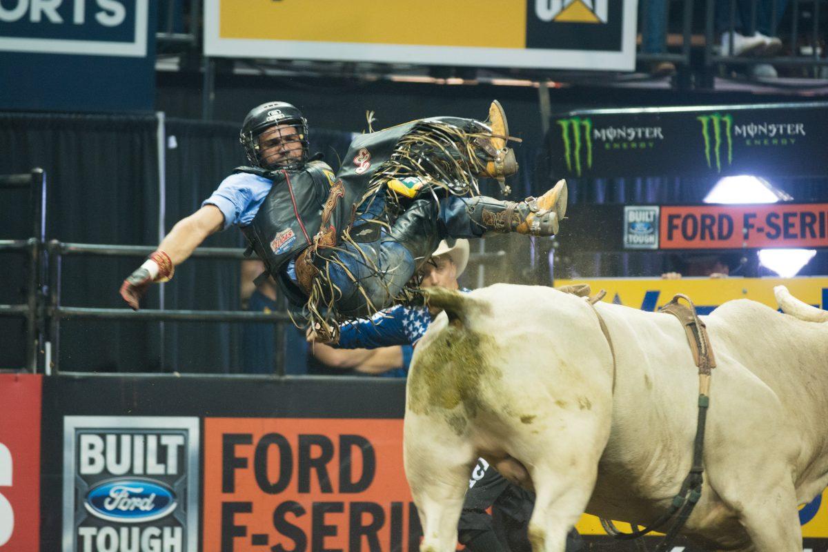 Rubens Barbosa fings off his bull. Professional Bull Riders hosts the Wrangler Long Live Cowboys Classic at Matthew Knight Arena in Eugene, Oregon on October 1, 2016. (Amanda Shigeoka/Emerald)