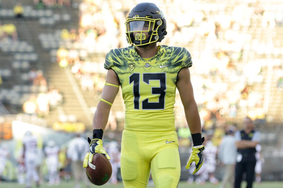 Oregon Ducks wide receiver Devon Allen (13) walks with the ball during warm ups. The No. 24 Oregon Ducks play the Virginia Cavaliers at Autzen Stadium in Eugene, Ore. on Sept. 10, 2016. (Kaylee Domzalski/Emerald)