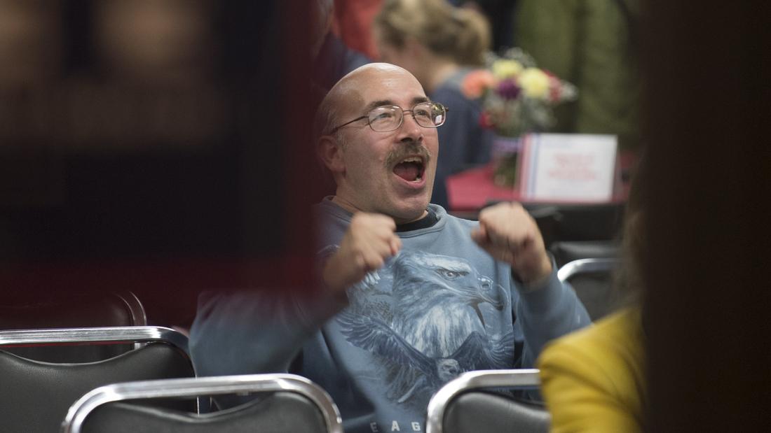 Jim Stefano from Eugene cheers as Fox News displays Trump gaining more electoral college votes at the Vet's Club in Eugene, Ore. on Nov. 8, 2016. (Adam Eberhardt/Emerald)