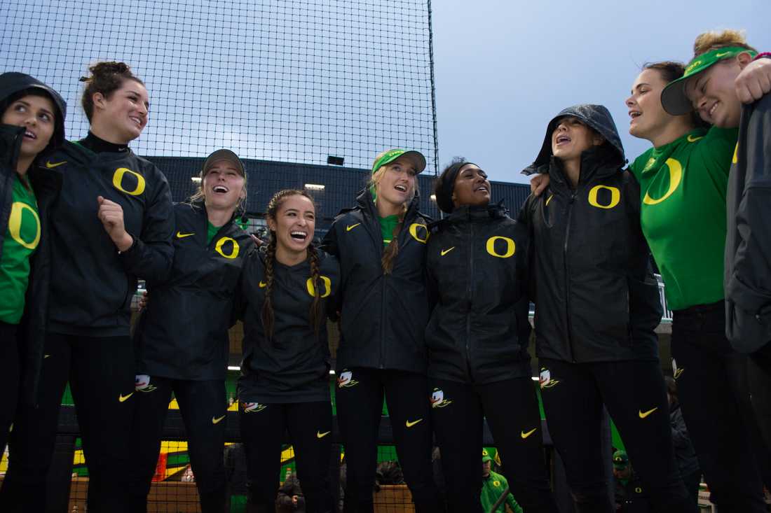 The Ducks put on a show for the crowd and sing their hearts out to their requested song, "No Air" by Jordin Sparks during the delay. The Oregon Ducks defeat the Pacific Tigers 8-0 at Jane Sanders Stadium on March 11, 2017. (Amanda Shigeoka/Emerald)