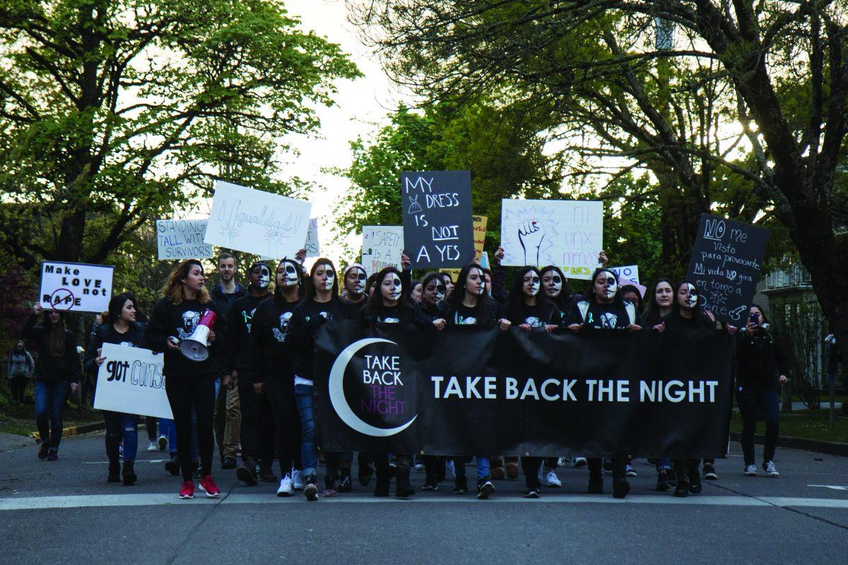 University of Oregon students, led by members of Mujeres, march down 15th Avenue. The ASUO Women&#8217;s Center and Sexual Assault Support Services of Lane County present Take Back the Night in Eugene, Ore. on Thursday, April 27, 2017. (Aaron Nelson/Emerald)