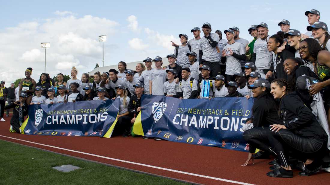 <p>Both the Oregon women's and men's track teams pose with their trophies after winning the PAC 12 Championships. The University of Oregon hosts the PAC 12 Track and Field Championships at Hayward Field in Eugene, Ore. on Saturday May 14, 2017. (Adam Eberhardt/Emerald)</p>