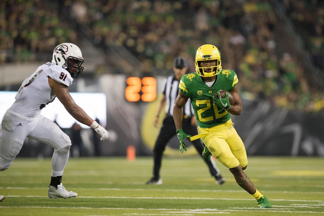 Oregon running back Tony Brooks-James (20) searches for an open path to the end zone. The Oregon Ducks start their season playing against the Southern Utah Thunderbirds at Autzen Stadium in Eugene, Ore. on September 2, 2017. (Phillip Quinn/Emerald)