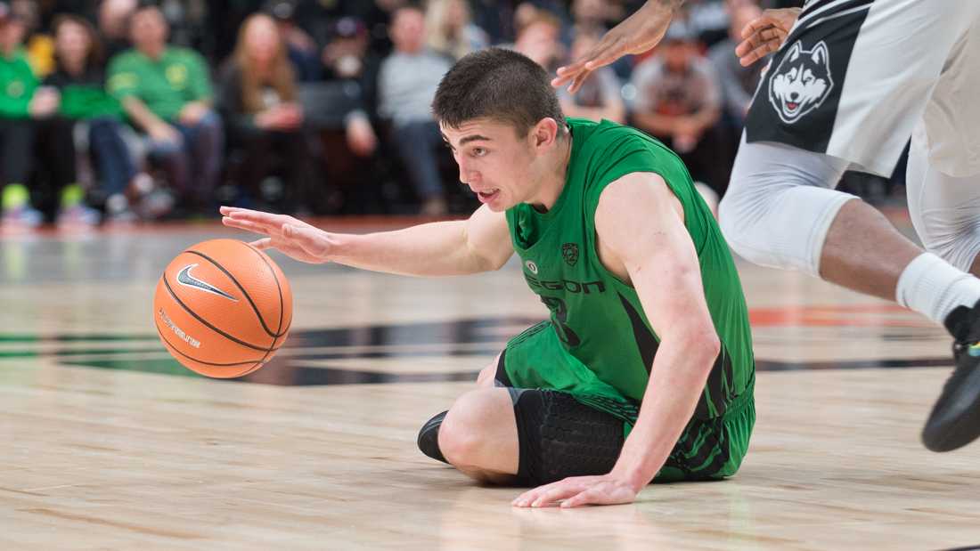 <p>Oregon Ducks guard Payton Pritchard (3) tries to control the ball after falling. The Oregon Ducks play the Connecticut Huskies during the first round of the Phil Knight Invitational tournament at the Moda Center in Portland, Ore. on Thursday, Nov. 23, 2017. (Adam Eberhardt/Emerald)</p>