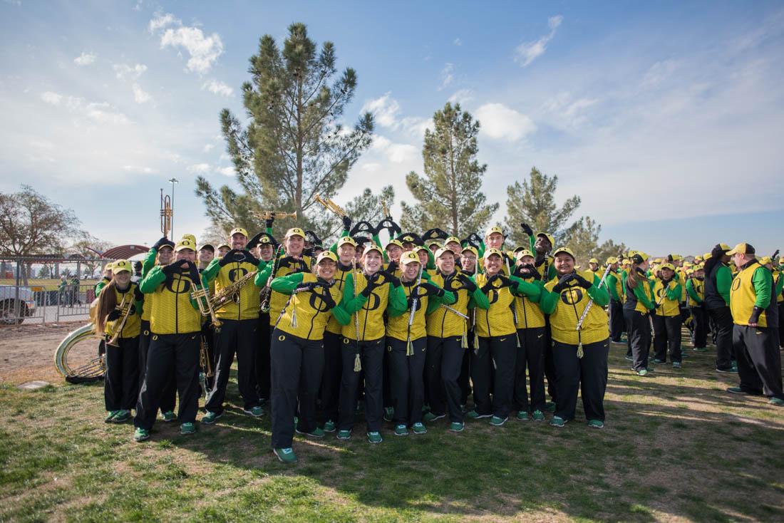 The Oregon Band poses for a picture outside of Sam Boyd Stadium. The Oregon Ducks face the Boise State Broncos at Sam Boyd Stadium for the Las Vegas Bowl on Saturday, Dec. 16, 2017. (Phillip Quinn/Emerald)