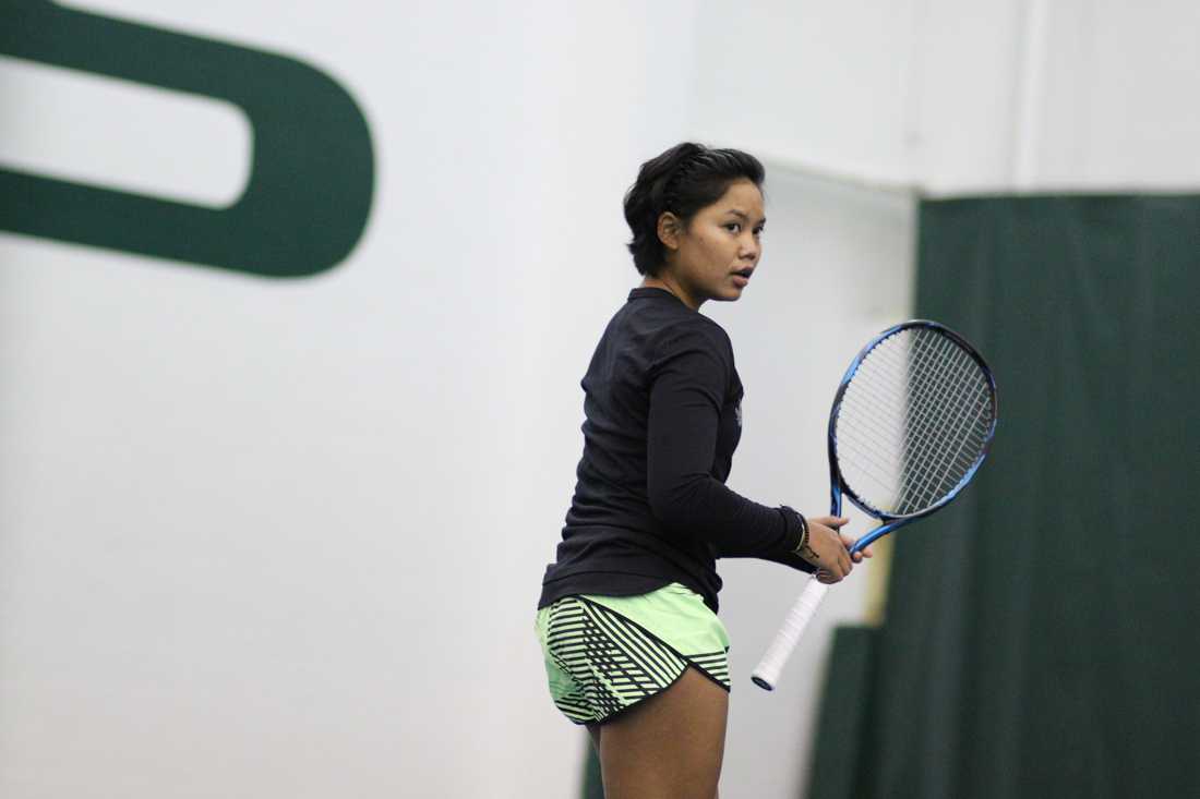 Oregon Ducks Rifanty Kahfiani pauses during her singles match. The Oregon Ducks face the Portland State Vikings at the Oregon Student Tennis Center in Eugene, Ore. on January 19, 2018. (Devin Roux/Emerald)