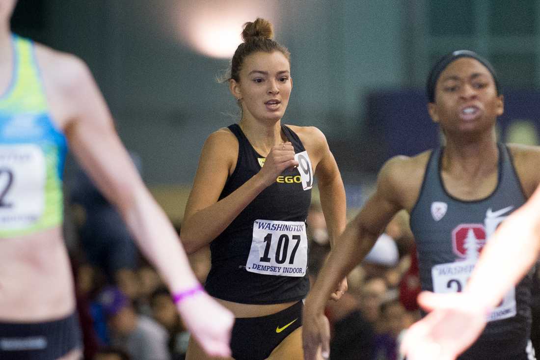 Oregon mid distance runner Lilli Burdon sprints toward the finish line in the 1000m prelim race. The Oregon Ducks participate in the UW Preview track meet hosted at the Dempsey Indoor Center in Seattle, Wash. on Saturday, Jan. 13, 2018. (Adam Eberhardt/Emerald)