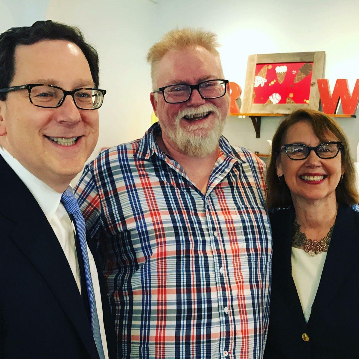 Red Wagon Creamery owner Stuart Phillips, pictured with UO president Michael Schill and Oregon Attorney General Ellen Rosenblum. (Red Wagon Instagram)