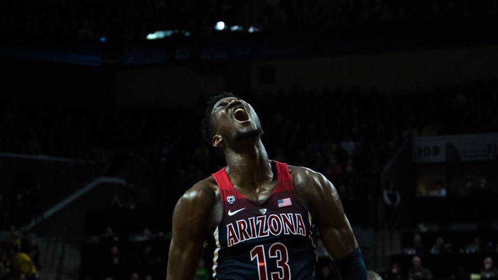 University of Arizona forward DeAndre Ayton (13) reacts after dunking the ball. Oregon basketball take on the University of Arizona Wildcats at Matthew Knight Arena in Eugene, Ore. on Feb. 24, 2018. (Ben Green/Emerald)