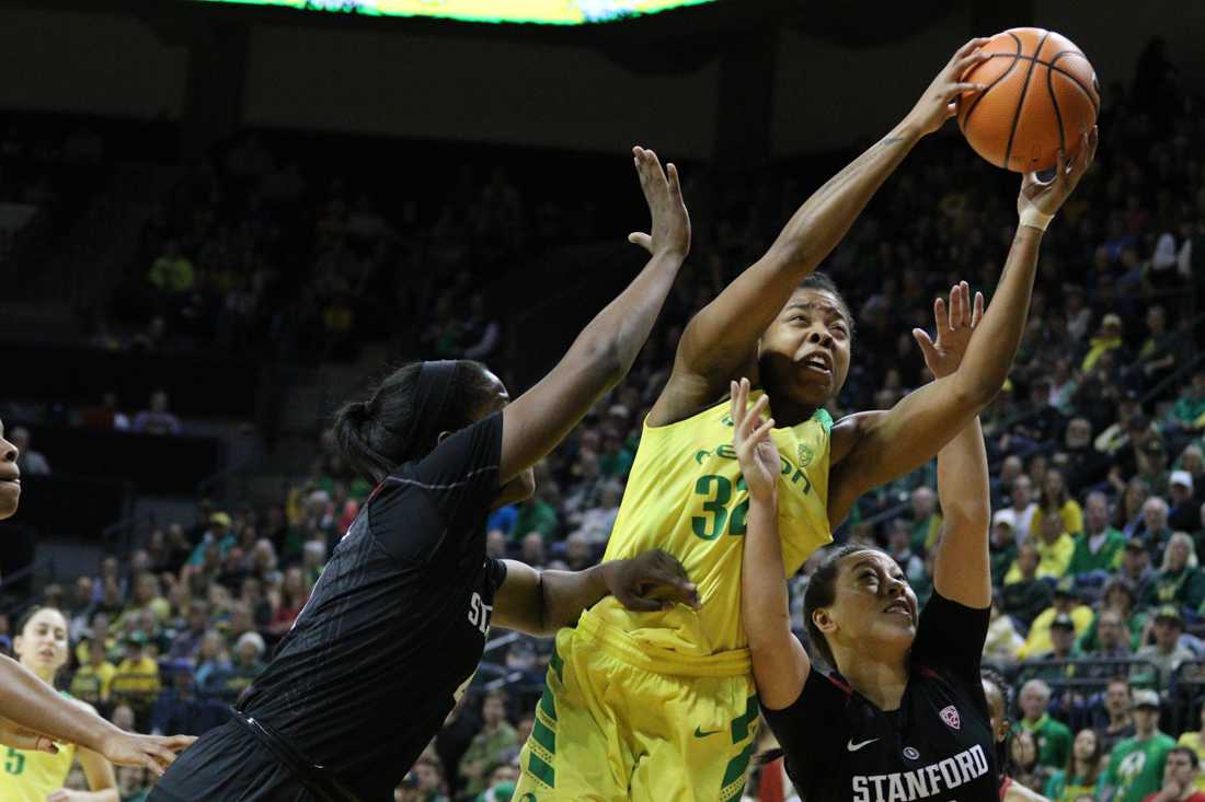 Oregon Ducks forward Oti Gildon (32) fights for the rebound. Oregon basketball take on the Stanford Cardinals at Matthew Knight Arena in Eugene, Ore. on Feb. 4, 2018. (Devin Roux/Emerald)