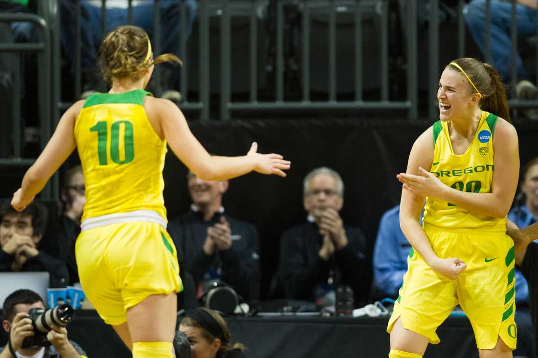 Oregon Ducks guard Sabrina Ionescu (20) celebrates with Oregon Ducks guard Lexi Bando (10) after she scored a basket. The No. 6 Oregon Ducks play the Minnesota Golden Gophers in the second round of the NCAA Tournament at Matthew Knight Arena in Eugene, Ore. on Sunday, March 18, 2018. (Adam Eberhardt/Emerald)