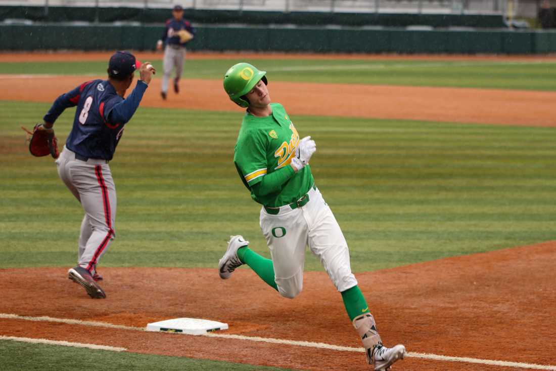 Oregon infielder Ryne Nelson (29) runs past first base and gains an out for the Ducks. The Oregon Ducks play the Florida Atlantic Owls at PK Park in Eugene, Ore. on Saturday March 3, 2018. (Kiara Green/Emerald)