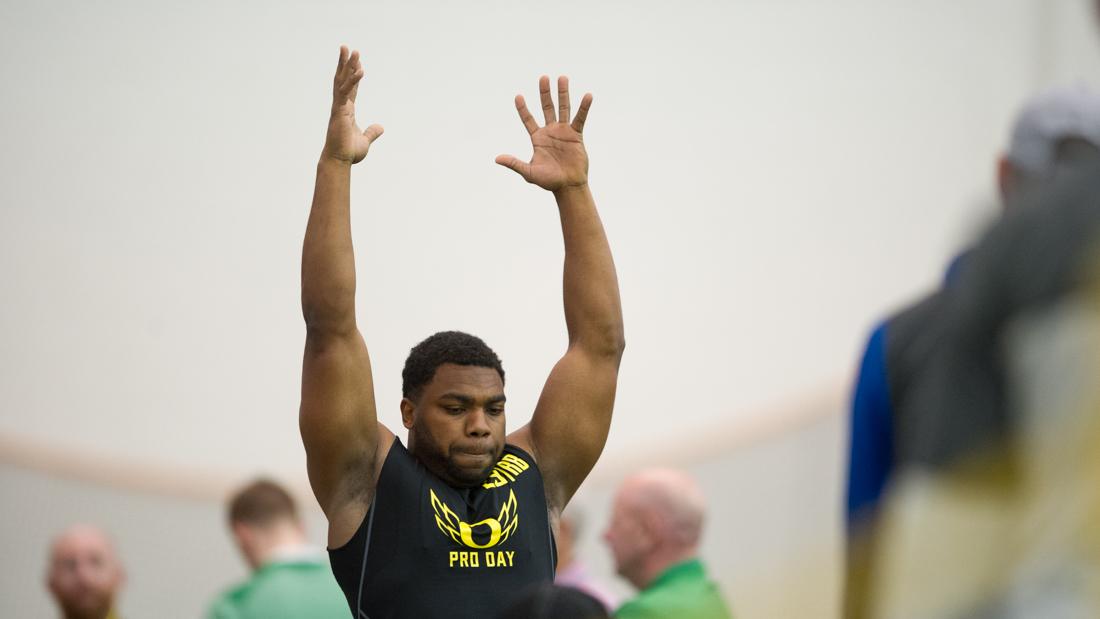 Former Oregon running back Kani Benoit prepares to do the broad jump. Oregon Football hosts its annual NFL Pro Day for scouts to view the talent of 2018 draft eligible players at the Moshofsky Center in Eugene, Ore. on Thursday, March 15, 2018. (Adam Eberhardt/Emerald)