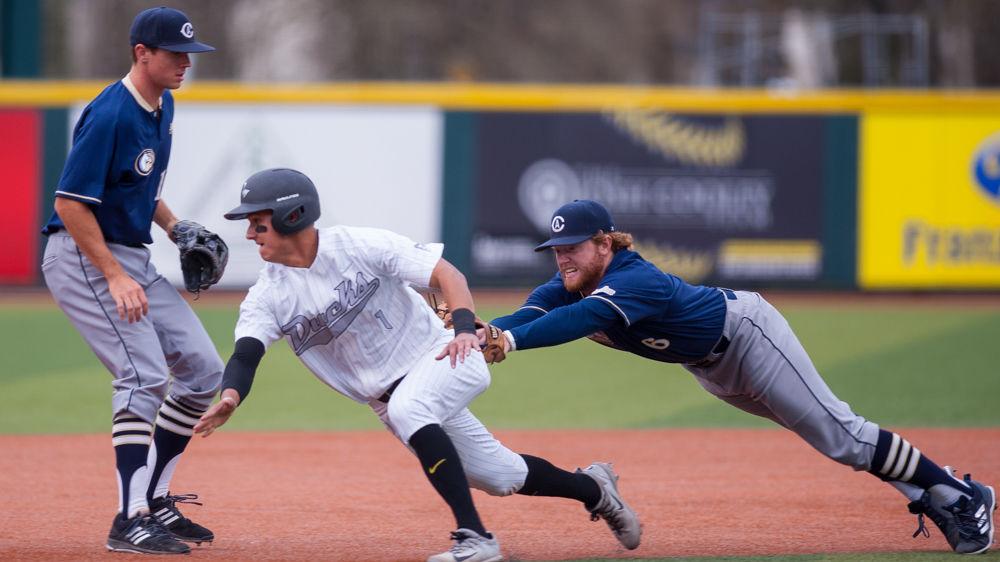 Ducks infielder Kyle Kasser (1) gets tagged out inches from third base. The Oregon Ducks play the UC Davis Aggies at PK Park in Eugene, Ore. on Saturday March 10, 2018