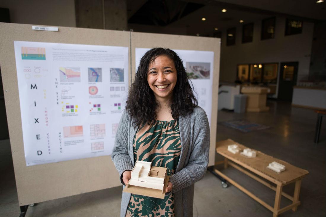 Ali Lau, an architecture graduate student, holds a model of her project. She received four nominations to be featured in an Emerald edition honoring women in the UO community for Women&#8217;s History Month. (Phillip Quinn/Emerald)