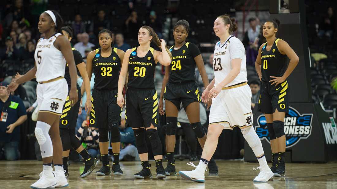 Members of the Oregon women&#8217;s basketball team watch the clock count down near the end of the game. The Oregon Ducks play Notre Dame in the Elite Eight round of the NCAA tournament at the Spokane Veterans Memorial Arena in Spokane, Wash. on Monday, March 26, 2018. (Adam Eberhardt/Emerald)