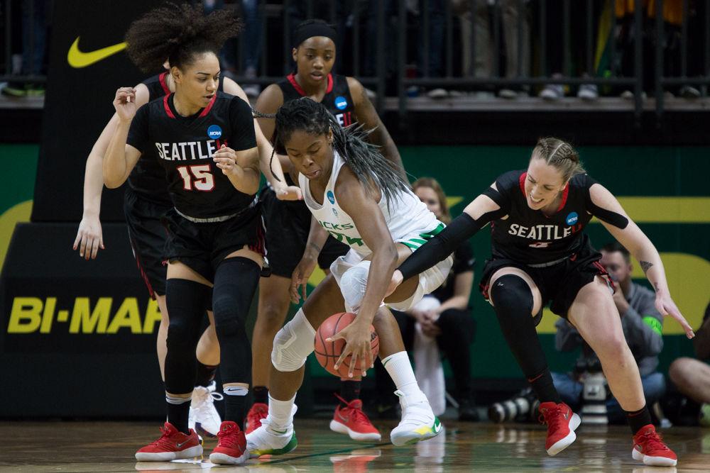 Ducks forward Ruthy Hebard (24) regains control of the loose ball. The No. 6 Oregon Ducks play the Seattle University Redhawks in the first round of the NCAA Tournament at Matthew Knight Arena in Eugene, Ore. on Friday, March 16, 2018. (Ben Green/Emerald)