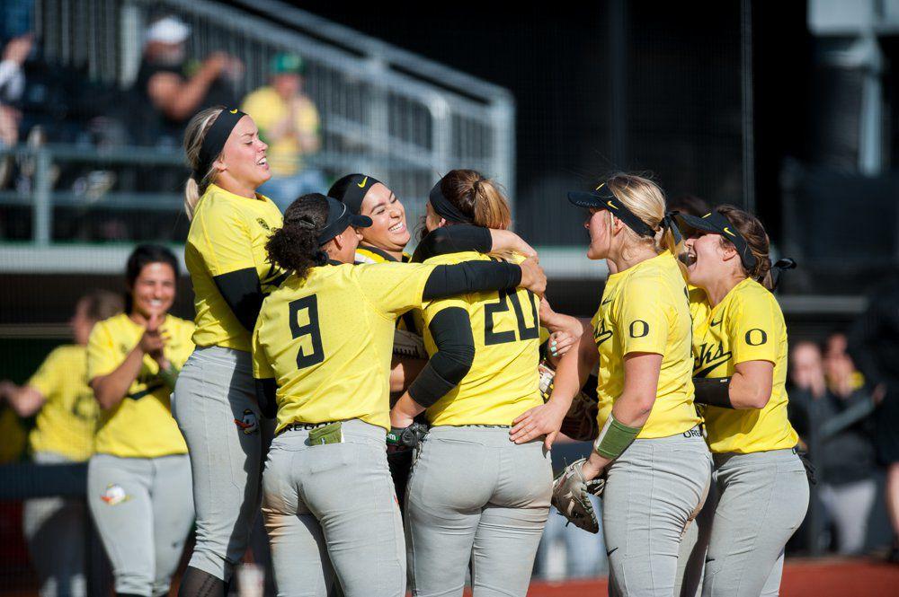 The Oregon Ducks celebrate their second win of the day. The Oregon Ducks play the Bryant University Bulldogs at Jane Sanders Stadium in Eugene, Ore. on Sunday March 11, 2018. (Ben Green/Emerald)