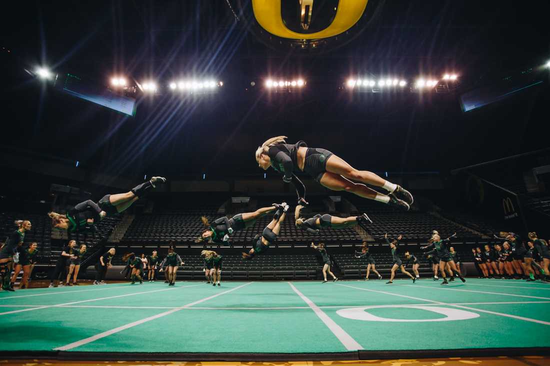 The Ducks perform a final routine. Oregon Acrobatics and Tumbling falls to Baylor 824.285-286.75 in rematch for final home meet at Matthew Knight Arena on April 8, 2018. (Sarah Northrop/Emerald)