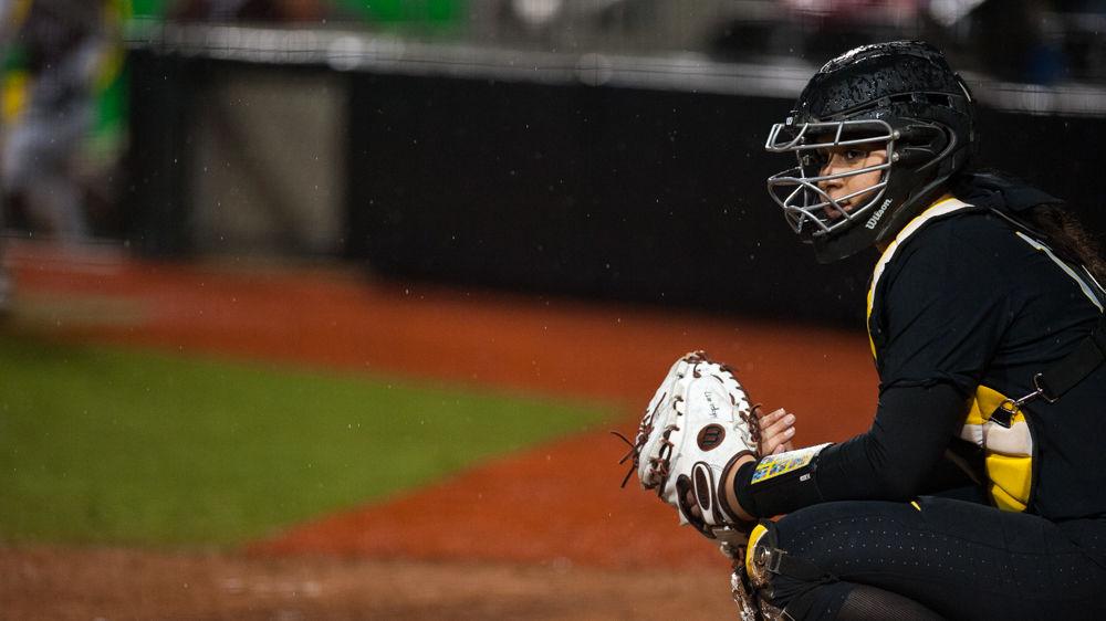 Stepping onto the college diamond for a freshman can be daunting. Under the lights, in front of several thousand fans with television cameras surrounding them, they play with and face some of the best players in the country. When Oregon softball&#8217;s freshman catcher Mary Iakopo stepped up to the plate &#8230;