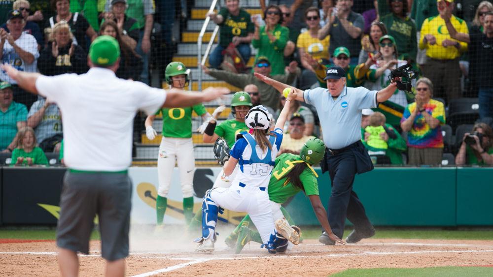 Ducks outfielder Cherish Burks (31) sides safely into home plate. The Oregon Ducks play the Drake Bulldogs at Jane Sanders Stadium in Eugene, Ore. on Saturday May 19th, 2018. (Ben Green/Emerald)